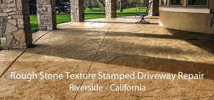 Rough Stone Texture Stamped Driveway Repair Riverside - California